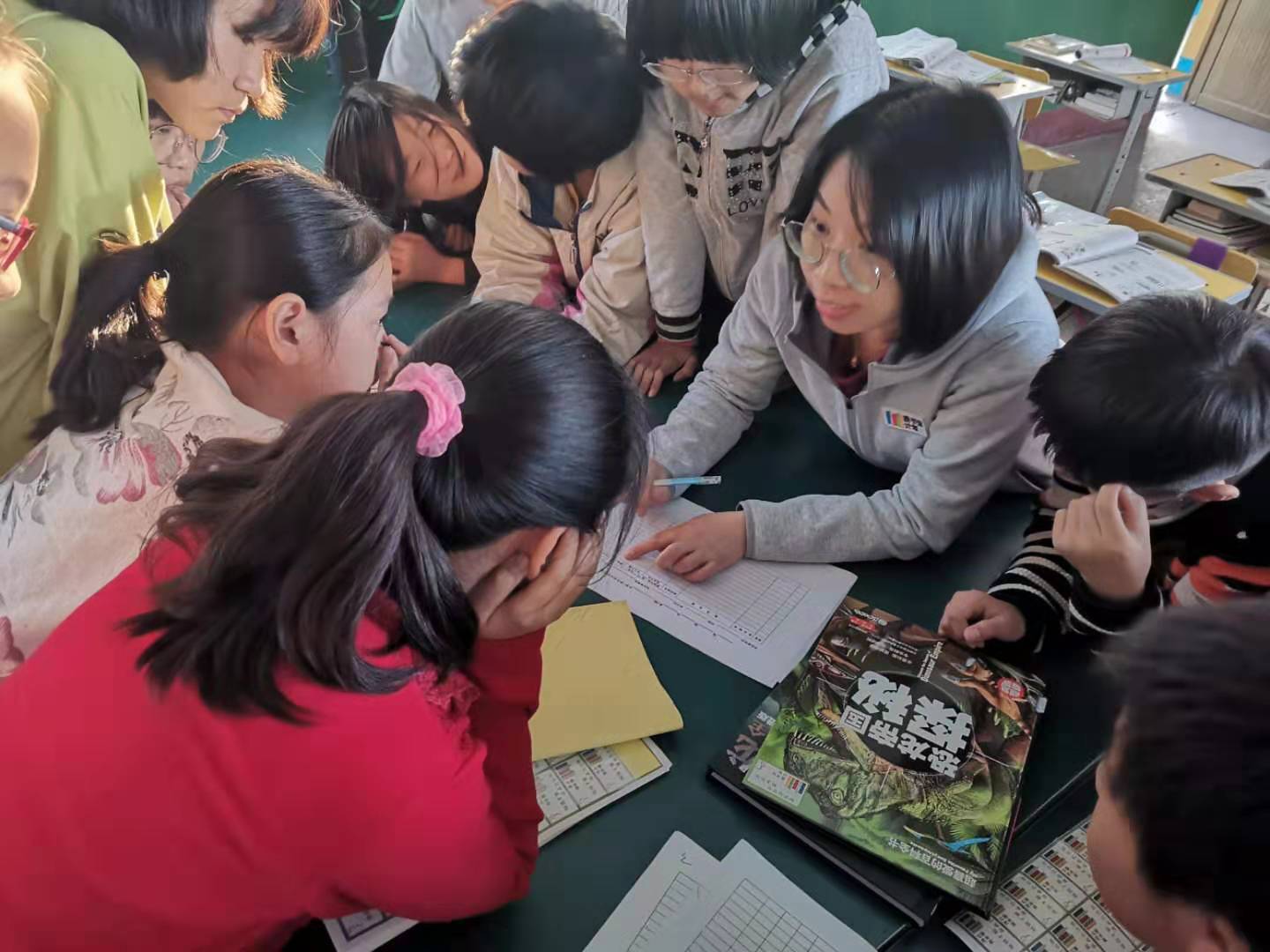 TLP staff is training student-librarian for their classroom reading corners.jpg